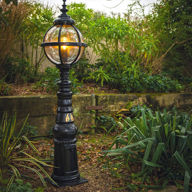 Victorian style globe pedestal light in cast iron