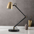 Matt Black & Satin Brass With Its Sleek, Minimalist Design, The Anglepoise Lamp Fits Well In Both Modern And Traditional Settings. Its Clean Lines And Functional Form Make It A Stylish Addition To Any Desk Or Table.