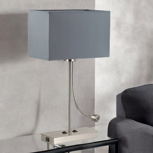 This Is A Contemporary Table Lamp With Dual Lighting Functionality, Designed For Modern Living And Hospitality Spaces.