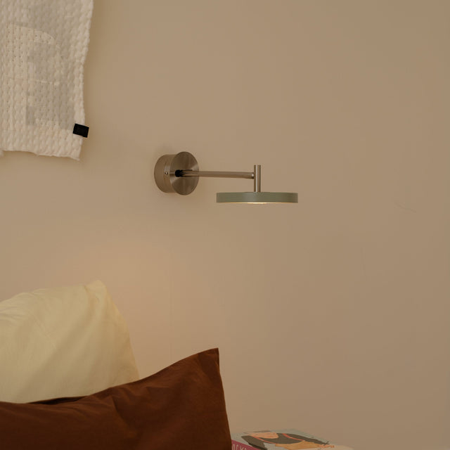 Asteria Long wall lamp, steel, nuance olive, hardwired - lifestyle