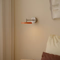 Asteria Short wall lamp, steel, nuance orange, hardwired - lifestyle
