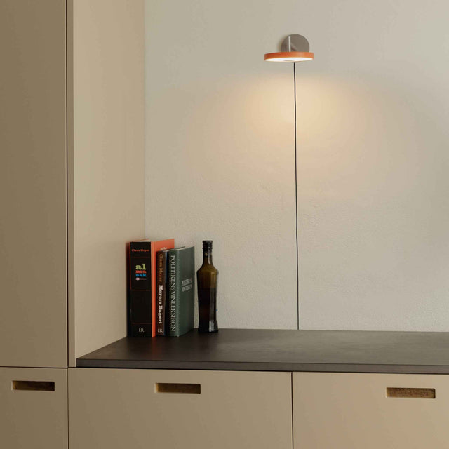 Asteria Short wall lamp, steel, nuance orange - lifestyle