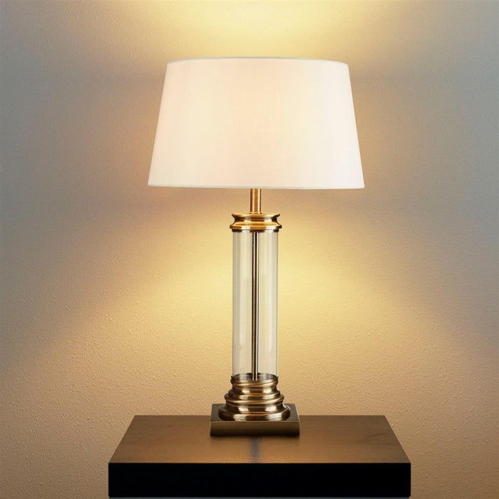 PEDESTAL TABLE LAMP - GLASS COLUMN & ANTIQUE BRASS BASE, CREAM SHADE